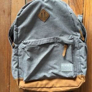 Gray and Tan Backpack with Durable Fabric and Classic Design